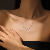 Silver Wave Heartbeat Necklace